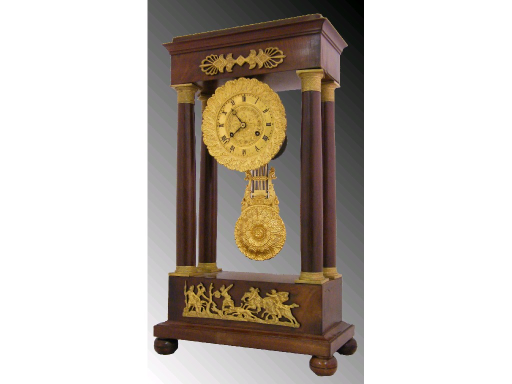 Appraisal: Mahogany and ormolu two train portico mantel clock the movement