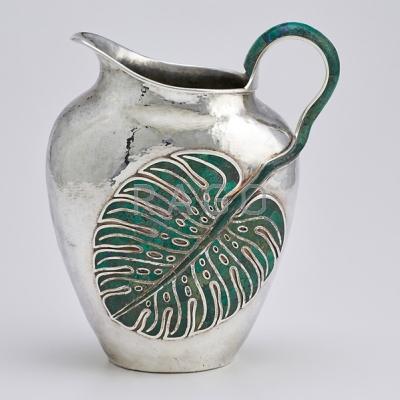 Appraisal: EMILIA CASTILLO STERLING LEAF PITCHER Spot-hammered silver oval vessel inlaid