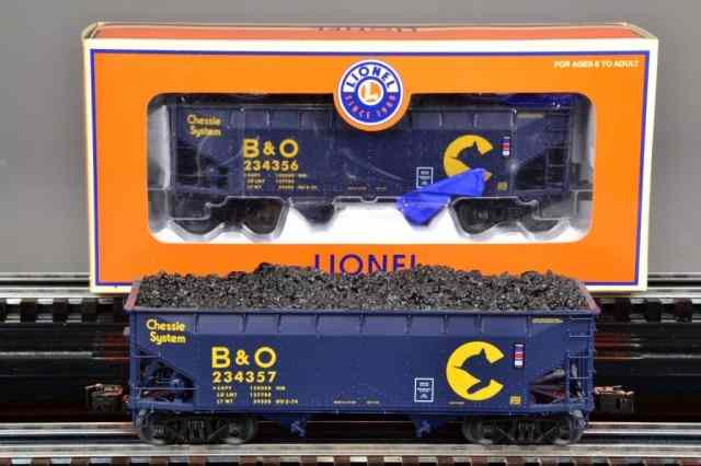 Appraisal: LIONEL SYSTEM HOPPERThree identical Chessie hoppers painted navy blue with