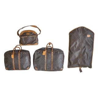 Appraisal: LOUIS VUITTON MONOGRAM CANVAS LUGGAGE Four A soft-sided Sirius suitcase