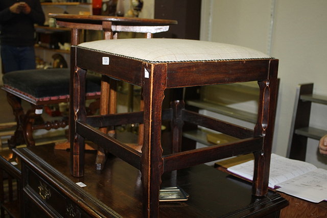 Appraisal: A COTSWOLD STYLE OAK STOOL with upholstered cover circa cm