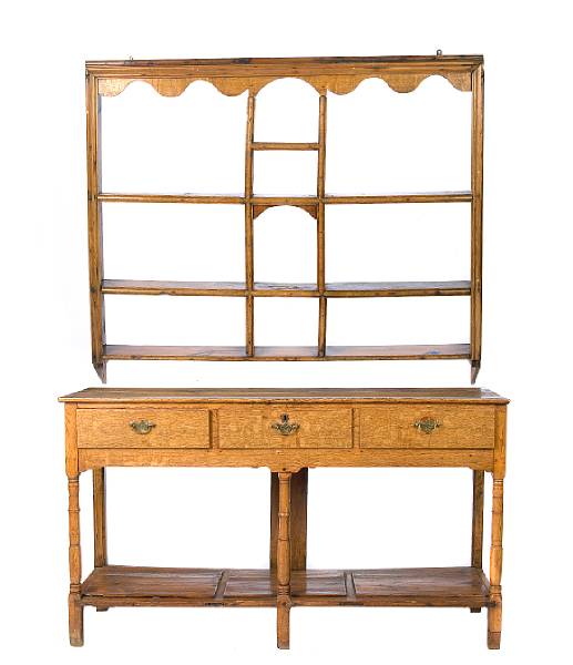 Appraisal: A Provincial oak dresser and associated hanging shelf height in