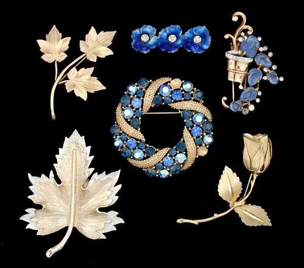 Appraisal: Lisner Giovanni Sarah Coventry Floral Brooch Collection Three Lisner brooches