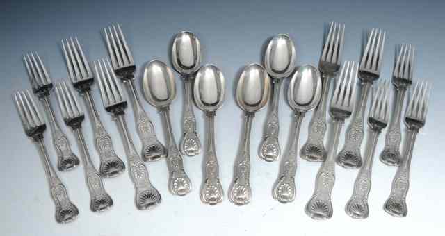 Appraisal: A SUITE OF SILVER SHELL PATTERN CUTLERY comprising six dinner