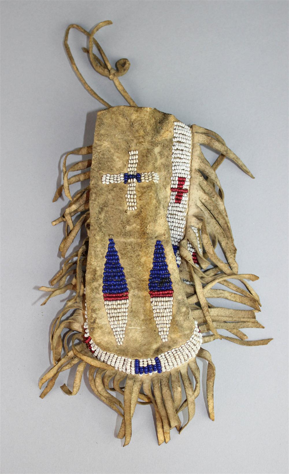 Appraisal: NATIVE AMERICAN BEADED AND FRINGED HIDE POUCH PLAINS ca supple