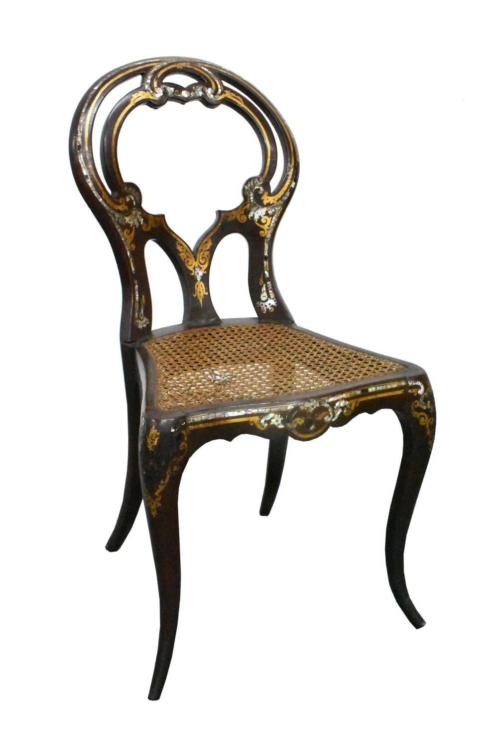 Appraisal: Circa The reddish-brown lacquer side chair with a caned seat