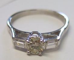 Appraisal: A diamond set three stone ring claw set with the