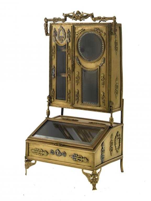 Appraisal: A PALAIS ROYAL GILTMETAL MINIATURE VITRINE IN THE FORM OF