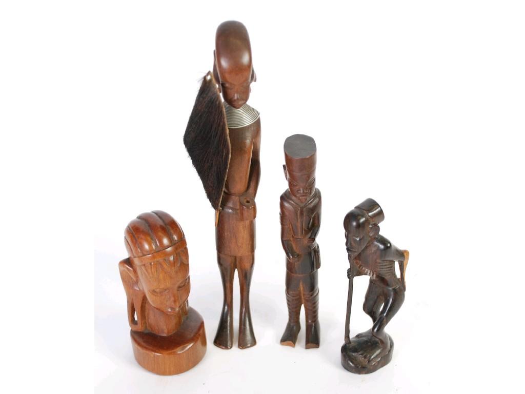 Appraisal: FOUR AFRICAN SMALL CARVED WOOD FIGURES EST -