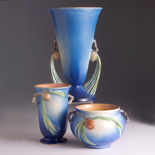 Appraisal: Three ROSEVILLE blue Pine Cone vases - - jardiniere and