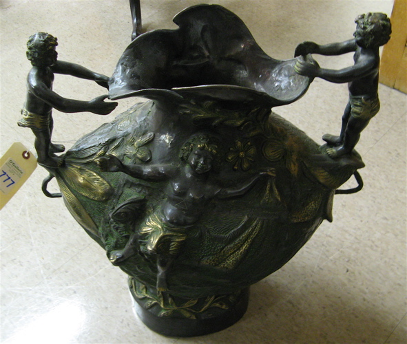 Appraisal: BRONZE FLOOR URN the footed ovoid vessel cast with overall