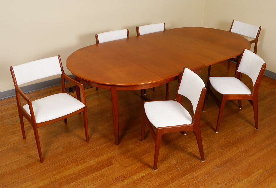 Appraisal: TREKANTEN DANISH MODERN DINING TABLE AND CHAIRS Dining table with