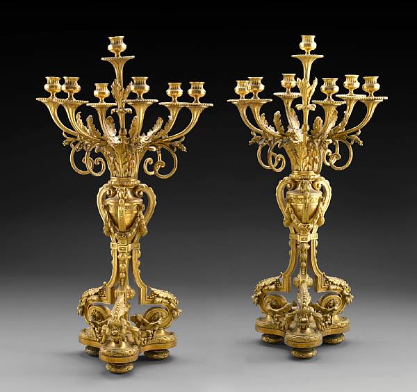 Appraisal: A pair of Louis XVI style gilt bronze seven light