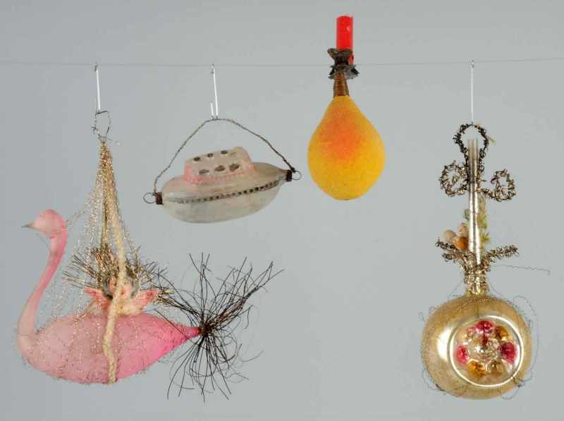 Appraisal: Lot of Blown Glass Ornaments Description Includes pink swan sailing