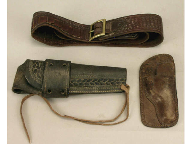 Appraisal: Collection of gun leather includes old heavy unmarked single loop