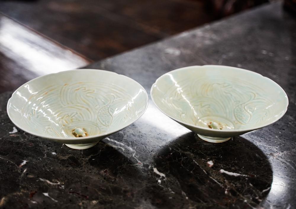 Appraisal: PAIR OF CHINESE GLAZED POTTERY BOWLSunmarked the interior having an