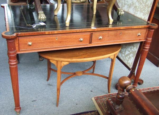 Appraisal: A Regency style mahogany library table the gilt tooled black