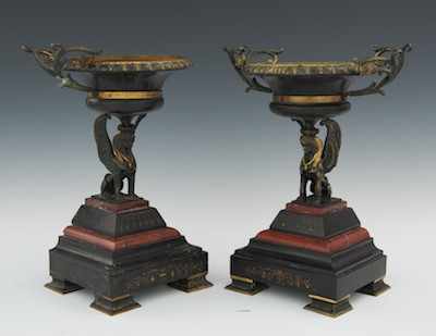 Appraisal: A Pair of Egyptian Revival Compotes With four squared feet