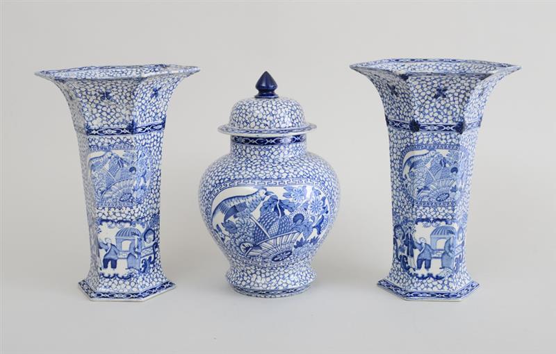 Appraisal: ADAMS DELFT BLUE AND WHITE THREE-PIECE MANTLE GARNITURE Marked in