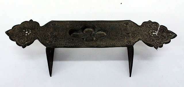 Appraisal: A PERSIAN METAL INCENSE BURNER with engraved and pierced detail