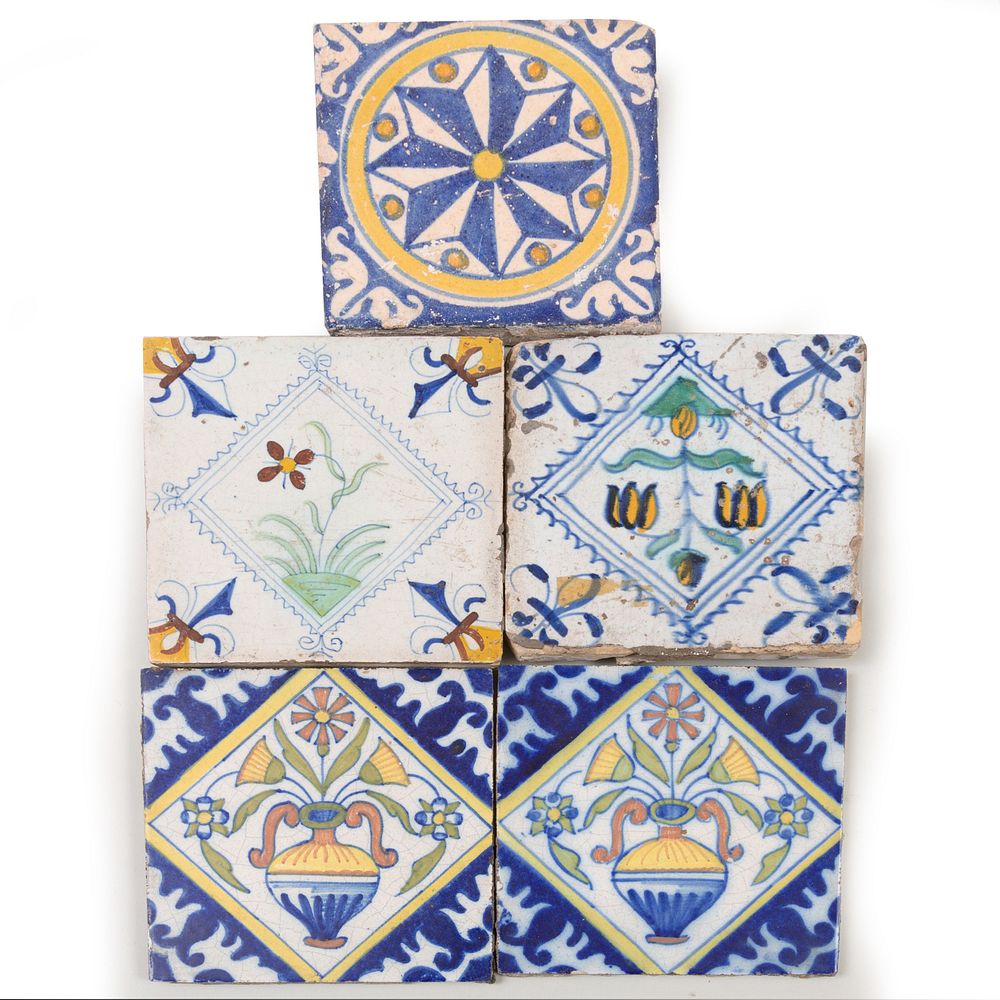 Appraisal: Four Delft Polychrome Tiles Together with a similar tile The