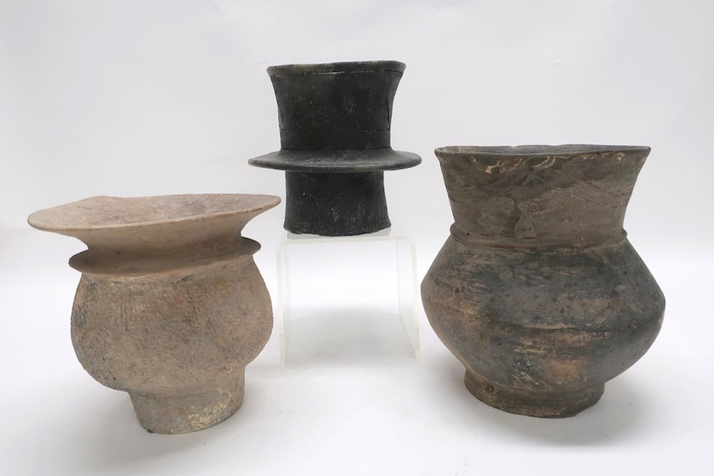 Appraisal: Unglazed Chinese Pottery Jars All with incised designs Largest is