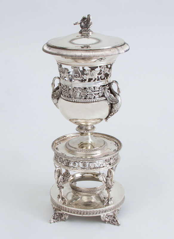 Appraisal: RESTAURATION SILVER URN ON STAND Marked 'ML' flanking bird and