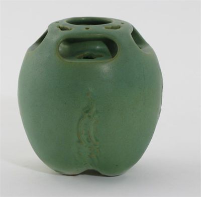 Appraisal: A Teco pottery vase ovoid with pierced quattro lobed shoulder