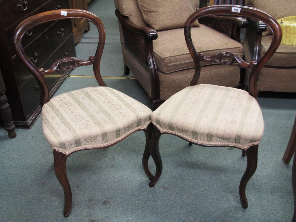 Appraisal: Pair of Victorian rosewood balloon back dining chairs