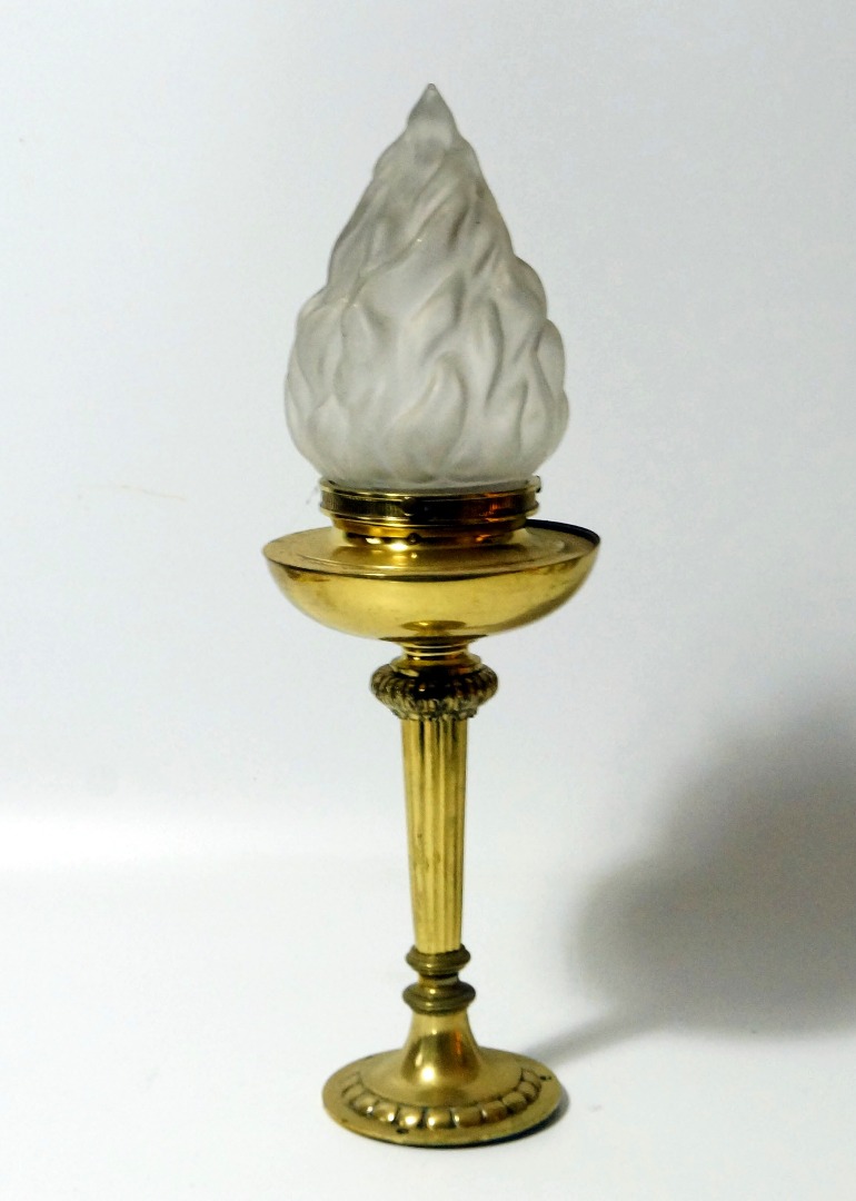 Appraisal: A brass torch form table lamp cm high