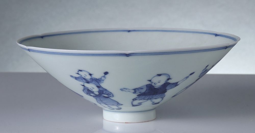 Appraisal: A FINE SMALL CHINESE 'HUNDRED BOYS' PORCELAIN BOWL The shallow