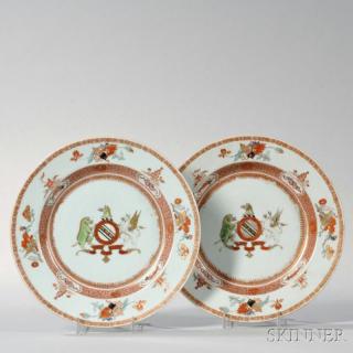 Appraisal: Pair of Armorial Export Porcelain Soup Plates China c centering