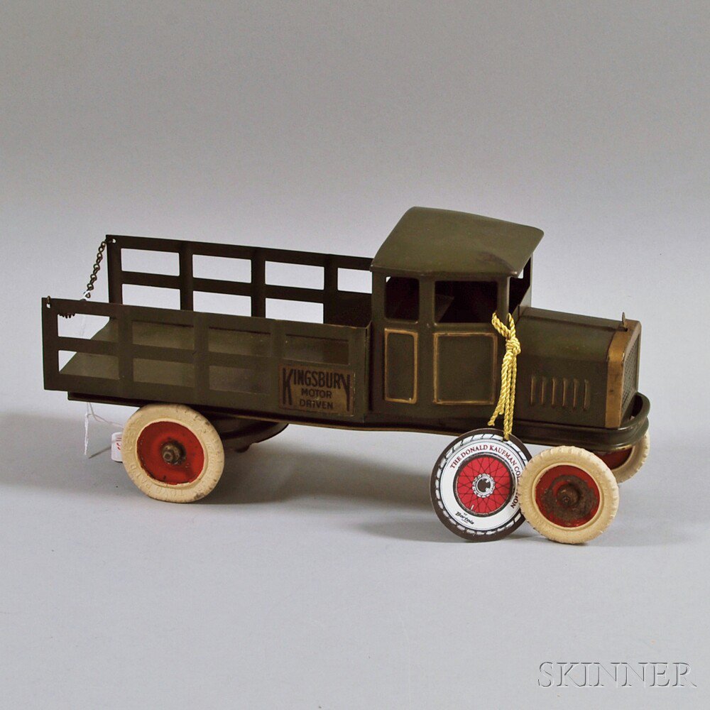 Appraisal: Kingsbury Motor-driven Stake Truck c the olive green body with