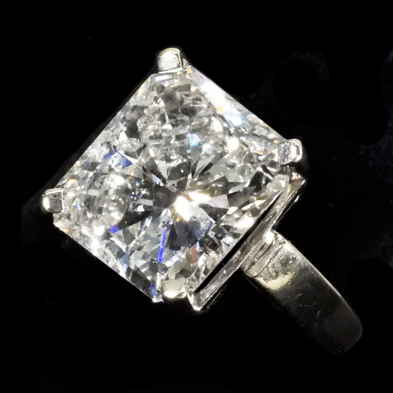 Appraisal: MAGNIFICENT CT DIAMOND RING KT GOLD One radiant cut diamond