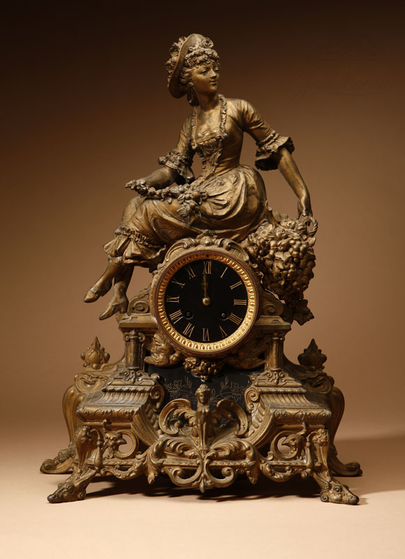 Appraisal: A Napoleon III ormolu and black marble figural clock A