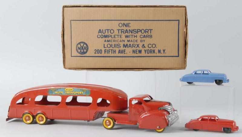 Appraisal: Pressed Steel Marx Auto Transport Toy Description American Early tin