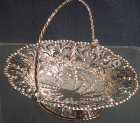 Appraisal: George III sterling silver basket with swing handles London by