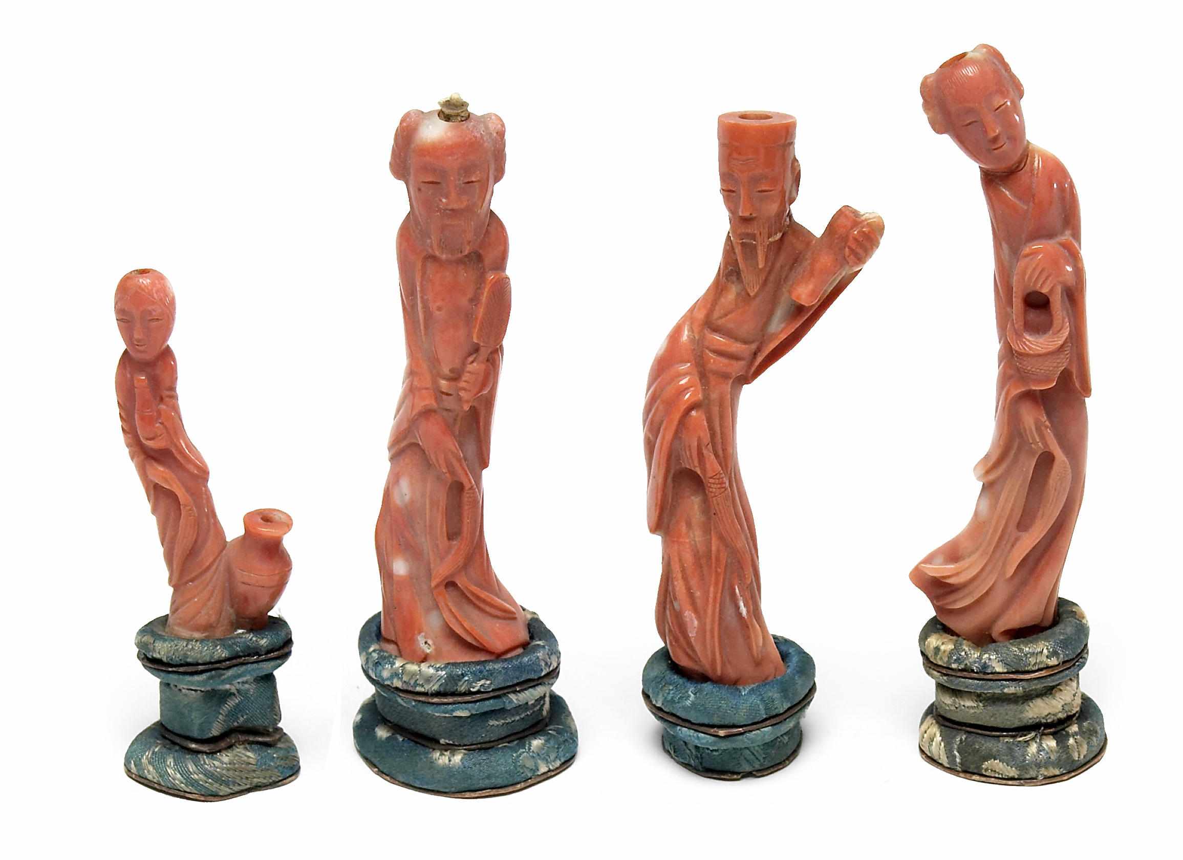 Appraisal: A group of four Chinese carved coral miniature figures circa