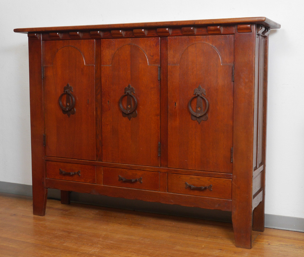 Appraisal: LARGE ARTS CRAFTS STYLE SIDEBOARD CABINET Stained oak with arts