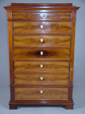 Appraisal: A French mahogany secretaire chest of seven long drawers th