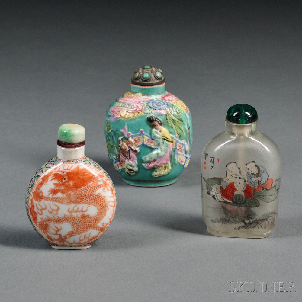 Appraisal: Three Snuff Bottles China a baluster shape with metal stopper