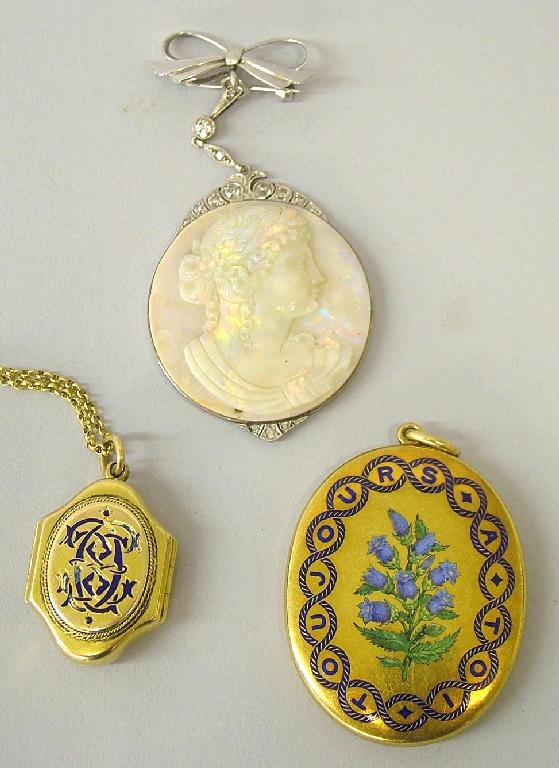 Appraisal: Gold and blue enamel double folding hinged locket revealing the