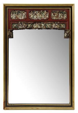 Appraisal: Decorative wall mirror th c parcel gilt ebonized frame carved