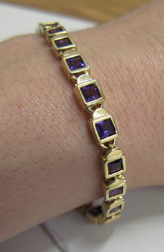 Appraisal: AMETHYST AND FOURTEEN KARAT GOLD BRACELET inches in length and