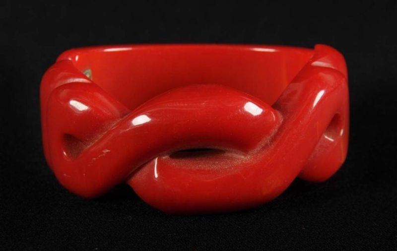 Appraisal: Bakelite Red Clamp Bracelet with Chain Link Design Condition Excellent