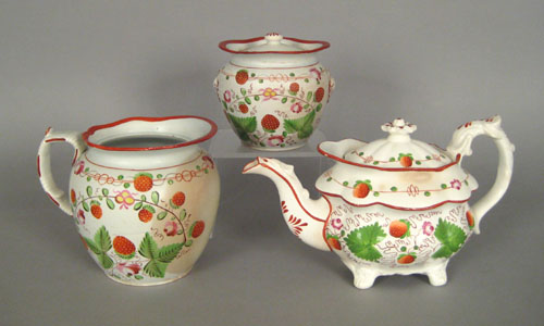 Appraisal: Staffordshire strawberry decorated ovoid pitcher together with a covered sugar