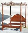 Appraisal: CANOPY BED - Monumental custom mahogany canopy bed Ornately carved