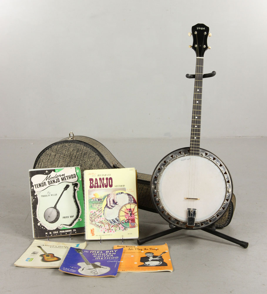 Appraisal: - Vega Four String Banjo with Case and Books Vega