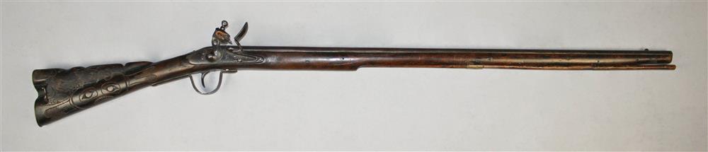 Appraisal: NORTHWEST INDIAN TRADE GUN BY BARNETT DATED WITH DECORATIVE CARVING