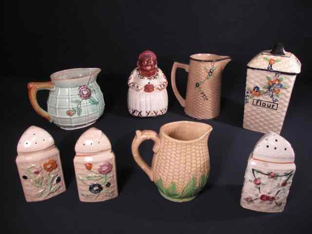 Appraisal: Assorted pieces of basket weave pottery Includes a floral pitcher